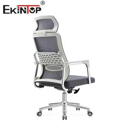 Kursi kantor ergonomis dengan material mesh abu-abu dan dukungan punggung headrest